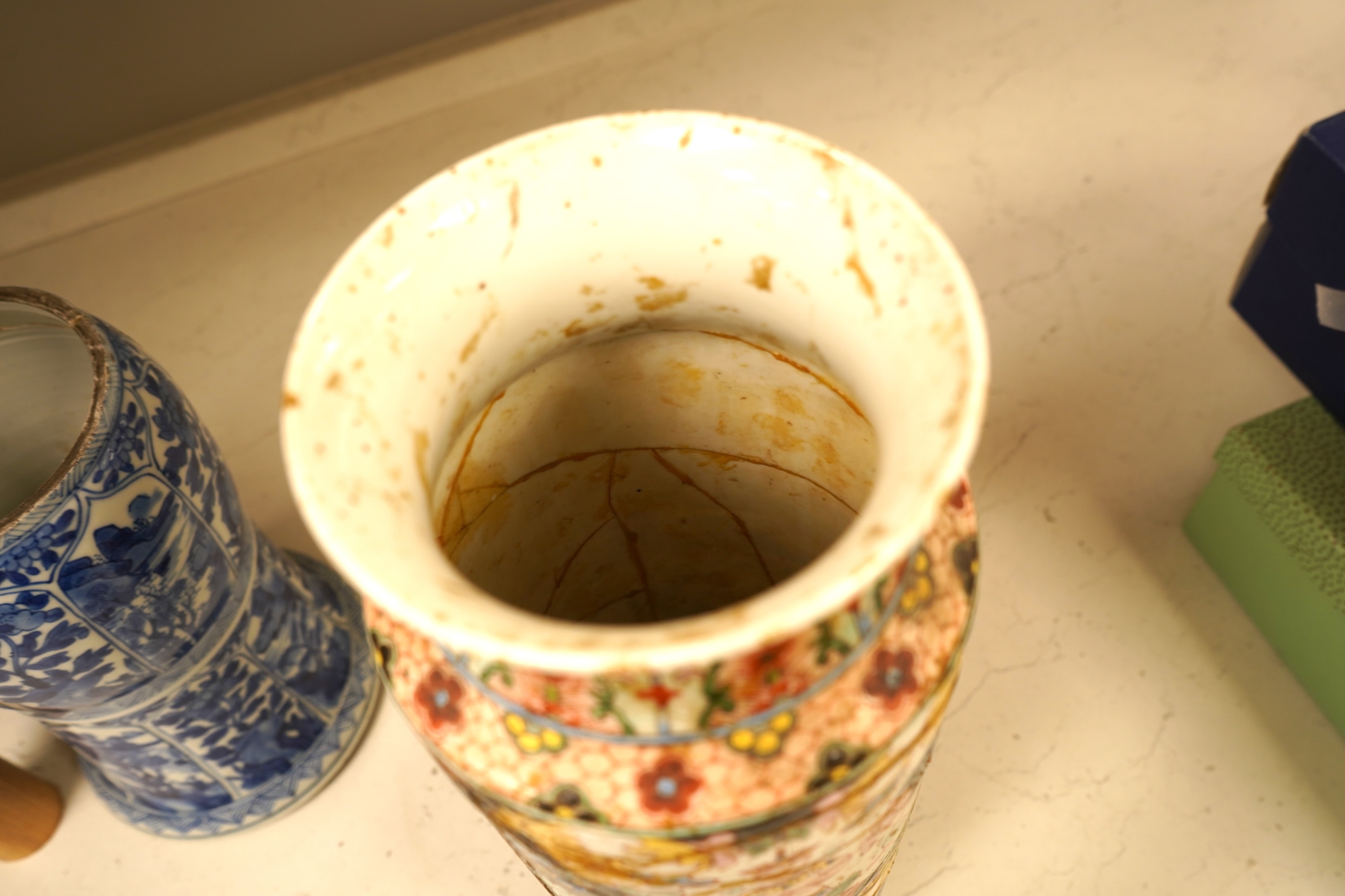 A Chinese Kangxi blue and white vase (cut down gu vase), 26cm high and a Chinese Bencharong famille rose vase